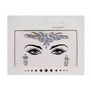 Detail of glow-in-the-dark face crystal stickers with iridescent AB rhinestone finish