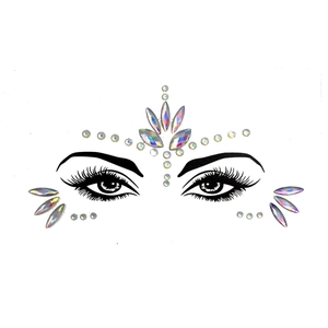 Detailed view of iridescent teardrop face gems and luminous crystal forehead jewels