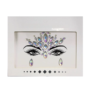 Macro detail of multicolor Halloween face crystal stickers in professional retail packaging