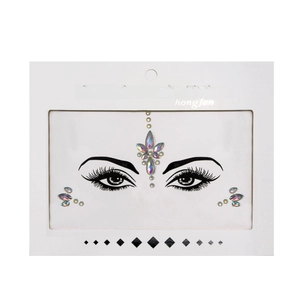 Detailed view of iridescent glowing face crystals in white branded window packaging