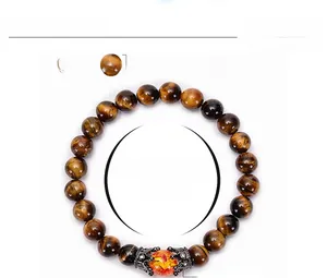 Detailed specs for 8mm tiger eye bead bracelet with crown charm and 6.6 inch circumference