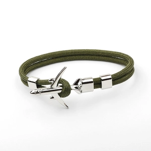 Close-up of military green nylon rope bracelet with a silver airplane anchor clasp