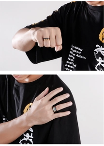 Three-color titanium steel ring set on model showing gold, black and silver finishes