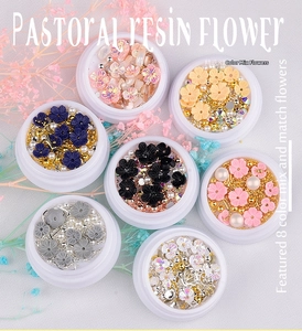 Floral nail art charms set featuring 3D resin flowers and mixed pearls in round containers