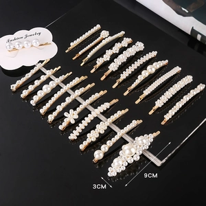 Handmade woven pearl bow hair clip set with gold metal finish and 9cm length scale