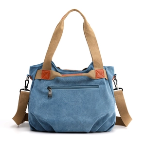 Large capacity vintage blue canvas tote bag with brown woven straps and crossbody strap