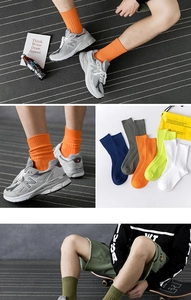 Detail showing ribbed texture and multiple vibrant colors of cotton crew socks