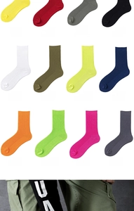 Detailed grid showing twelve colors of ribbed cotton mid-calf socks for men