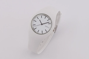 Close-up of stylish white silicone strap watch with a silver-rimmed dial by Geneva
