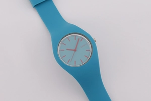 Close-up of Geneva silicone watch strap with red hands and markers on the dial