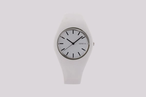 Close-up of white silicone strap and minimalist round dial on a Geneva quartz watch