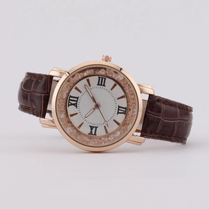 Fashionable rose gold quartz watch with floating crystals and brown leather strap