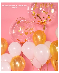 Detailed view of wedding balloon stickers with golden Love and We Are Married text