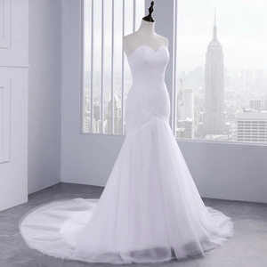 Elegant white mermaid evening dress with sweetheart neckline and ruffled mesh trail