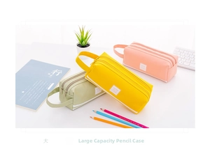 Estuches de lona de tres capas en amarillo verde y rosa con asas laterales resistentes