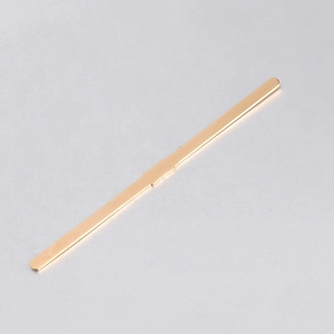 Detailed macro view of a 6mm wide polished golden stainless steel DIY bracelet bar