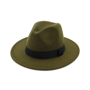 Close-up of wool felt jazz fedora hat in olive green with a wide black decorative ribbon