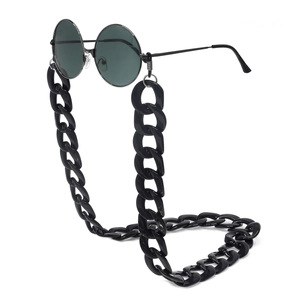 Retro round metal sunglasses with chunky black acrylic chain strap on white background