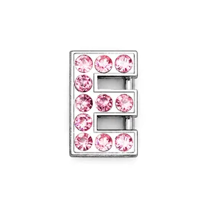 Detail of chrome-plated silver letter E charm featuring 11 sparkling pink round rhinestones