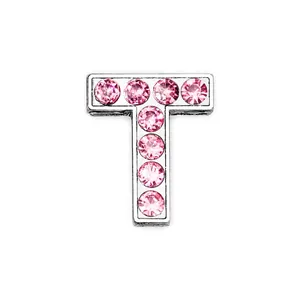 Close-up of chrome letter T charm inlaid with eight shiny pink rhinestones for DIY jewelry