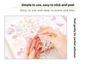 Close-up of peeling dreamlike crystal epoxy stickers with gold glitter and cat patterns
