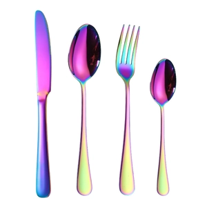 Modern 4-piece rainbow stainless steel cutlery set with knife fork and spoons on white background