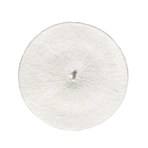 Top down macro view of white wool felt beret showing textured fabric and center stalk