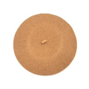 Top view of a classic camel wool beret showing fine felt texture and warm autumn color