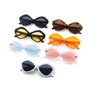Multiple irregular geometric sunglasses in various colors including tortoiseshell and black