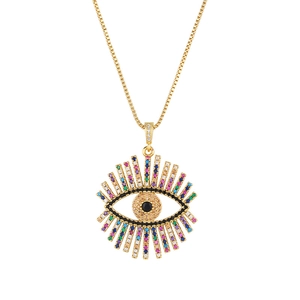 Macro view of micro-paved colorful zircon evil eye pendant on a golden box chain