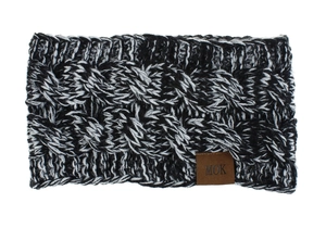 Detailed cable knit pattern on thick winter ear warmer headband with brown leather tag