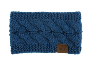 Close-up of navy blue cable-knit winter headband with premium leather logo tag detail