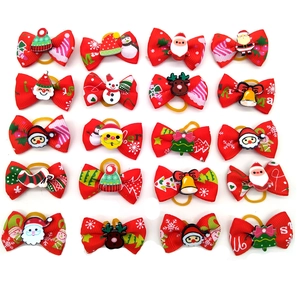 20-piece set of Christmas pet hair bows with Santa and reindeer motifs for dogs