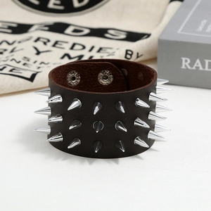 Punk men's leather bracelet with three rows of silver cone studs and snap buttons