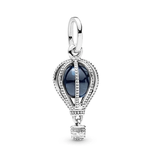 Silver hot air balloon charm with deep blue gemstone and heart pattern on white background