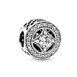 Charm rond en argent pavé de zircons brillants avec motif floral évidé sur le côté