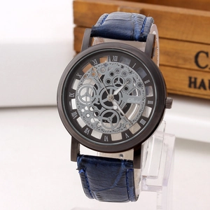 Detail of fashion skeleton quartz watch with blue leather strap and Roman numerals