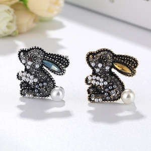 Cute rabbit brooches with sparkling crystals and white pearls in silver and gold colors