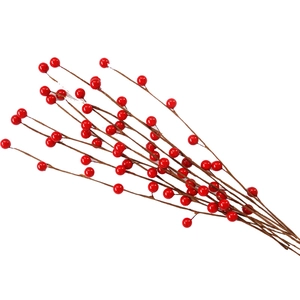 Artificial red berry stems with glossy finish for Christmas and home decor on white background
