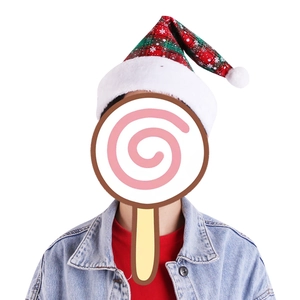 Detail of red and green plaid Christmas hat with white plush trim worn by a model