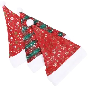 Detailed view of plush Christmas hats featuring red snowflake and green plaid patterns