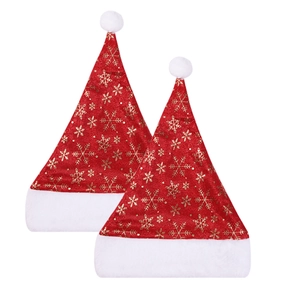 Detail of red plaid Christmas hats with golden snowflake patterns and white plush trim