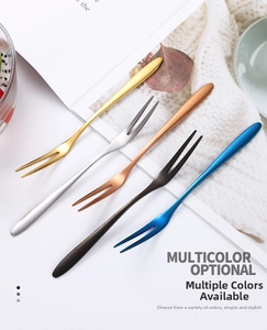 Detailed macro view of five multicolor 304 stainless steel two-prong fruit dessert forks