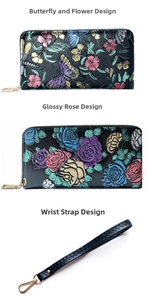 Detail of floral embossed leather wallets with butterfly patterns and zip closure