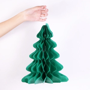 Detail of hanging green honeycomb paper Christmas tree ornament for party decoration