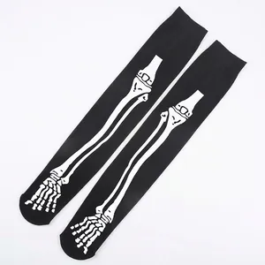 Halloween over-the-knee socks featuring white skeleton bone prints on black elastic fabric