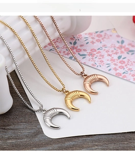 Detailed comparison of crescent moon pendants in gold, silver, and rose gold box chains