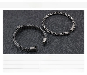 Macro shot of vintage black stainless steel chains with product weight specifications