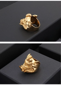 Detailed side view of a vintage gold wild boar ring with punk style 3D carving details