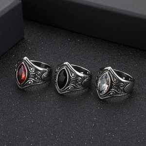 Vintage stainless steel ring set with marquise red ruby and ornate floral engraving